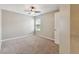 Bedroom with neutral carpet, ceiling fan, and a window at 3530 Brook Crossing Dr, Brandon, FL 33511