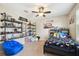Bedroom with toys, a bed, and ceiling fan at 3530 Brook Crossing Dr, Brandon, FL 33511