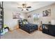 Bedroom filled with fun decor, plush carpet, and a ceiling fan at 3530 Brook Crossing Dr, Brandon, FL 33511
