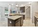 Open-concept kitchen with a view to living area and staircase at 3530 Brook Crossing Dr, Brandon, FL 33511