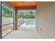 The screened patio has a view of the pool at 3530 Brook Crossing Dr, Brandon, FL 33511