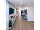 Bright, open-concept living room and kitchen with modern flooring and decor, creating a welcoming atmosphere at 368 6Th Nw St, Largo, FL 33770
