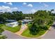 Charming single-story home featuring a spacious yard, inviting pool area, and a modern design at 3700 56Th N St, St Petersburg, FL 33710