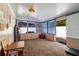 Comfortable sun room with a ceiling fan and lots of natural light at 3700 56Th N St, St Petersburg, FL 33710