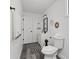 This remodeled bathroom features modern decor and a streamlined look at 4112 E Ellicott St, Tampa, FL 33610