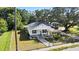 Charming home featuring a new roof, freshly painted exterior, and a spacious, well-maintained yard at 4112 E Ellicott St, Tampa, FL 33610