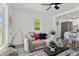 Bright, open living space, seamlessly blending the living room, dining area, and kitchen at 4112 E Ellicott St, Tampa, FL 33610