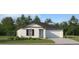 Charming single-story home featuring a well-manicured lawn, a two-car garage, and a welcoming entryway at 5769 Yellow Hornbill Ave, Wimauma, FL 33598