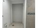 Bathroom featuring plumbing hookups and tile flooring ready to be customized at 587 Boca Ciega Point N Blvd, St Petersburg, FL 33708