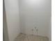 Bathroom with tan tiled floors, and freshly painted walls, ready for finishes at 587 Boca Ciega Point N Blvd, St Petersburg, FL 33708