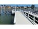 Well-maintained dock with fresh paint and clear water views at 587 Boca Ciega Point N Blvd, St Petersburg, FL 33708