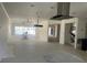 Open-concept living room with water views, ready for updates at 587 Boca Ciega Point N Blvd, St Petersburg, FL 33708