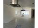 Spacious open concept living room ready for remodeling at 587 Boca Ciega Point N Blvd, St Petersburg, FL 33708