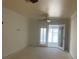 Spacious living room with doors to the lanai and backyard at 587 Boca Ciega Point N Blvd, St Petersburg, FL 33708