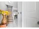 Welcoming entryway with stairs and view into the living spaces at 7608 Pasa Dobles Ct, Tampa, FL 33615