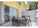 Outdoor patio area with seating, offering a relaxing space for outdoor enjoyment at 7608 Pasa Dobles Ct, Tampa, FL 33615