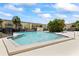 Inviting community pool area with ample space for relaxation at 7608 Pasa Dobles Ct, Tampa, FL 33615