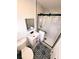 Updated bathroom featuring a shower with glass doors, vanity, and mosaic patterned floors at 811 40Th S Ave, St Petersburg, FL 33705