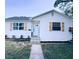 Charming single-story home featuring a new roof, fresh exterior paint, decorative shutters and landscaped yard at 811 40Th S Ave, St Petersburg, FL 33705