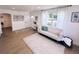 Inviting living room with wood-look floors, recessed lights, and a cozy seating area with decor at 811 40Th S Ave, St Petersburg, FL 33705