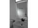 Bathroom sink and modern mirror with heater and light feature at 8524 Fish Lake Rd, Tampa, FL 33619