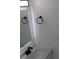 Modern bathroom features a lit mirror and elegant fixtures at 8524 Fish Lake Rd, Tampa, FL 33619