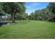 Over-sized lot offers a great space for entertaining and outdoor activities at 8610 Fish Lake Rd, Tampa, FL 33619