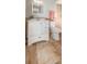 Bathroom with a white vanity, neutral tile and a functional toilet at 8610 Fish Lake Rd, Tampa, FL 33619