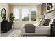 Serene bedroom with natural light, modern furnishings, plush bedding, and elegant decor at 9360 Gladsome Dr, Land O Lakes, FL 34637
