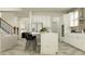 Bright, open kitchen featuring a spacious island with seating and an efficient layout at 9360 Gladsome Dr, Land O Lakes, FL 34637