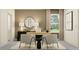 Well-lit office space with modern decor, including a desk, chairs, and artwork at 9360 Gladsome Dr, Land O Lakes, FL 34637