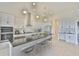 Spacious kitchen features a large island with bar seating, stainless steel appliances, and custom cabinetry at 955 Signet Dr, Apollo Beach, FL 33572