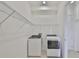 Laundry room with appliances and wire shelving at 955 Signet Dr, Apollo Beach, FL 33572
