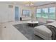 Living room featuring large windows with a view at 955 Signet Dr, Apollo Beach, FL 33572