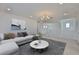 Living room boasting recessed lighting and marble coffee table at 955 Signet Dr, Apollo Beach, FL 33572