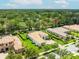 Overview of the community showcasing the manicured lawns and lush trees surrounding the stunning houses at 1014 Stella Vara Dr, Lutz, FL 33548