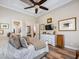 Bedroom with wood floors, recessed lighting, and neutral color scheme is warm and inviting at 1014 Stella Vara Dr, Lutz, FL 33548