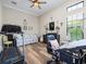 Spacious office with ample light, a ceiling fan, and various furnishings at 1014 Stella Vara Dr, Lutz, FL 33548