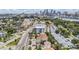 Scenic aerial showcases the skyline, waterfront, and a neighborhood with mature trees at 103 E Davis Blvd # B, Tampa, FL 33606