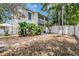 Townhouse with a rock and gravel backyard and a private patio area perfect for relaxing outdoors at 103 E Davis Blvd # B, Tampa, FL 33606