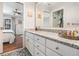 Granite countertops and vanity sink highlight this bathroom, conveniently connecting to the main bedroom at 103 E Davis Blvd # B, Tampa, FL 33606