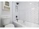 Clean bathroom featuring new subway tiles in the shower/tub and a built-in soap niche at 103 E Davis Blvd # B, Tampa, FL 33606