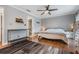 Cozy bedroom with hardwood floors and comfortable furnishings at 103 E Davis Blvd # B, Tampa, FL 33606