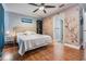 Well-lit main bedroom with hardwood floors connects to the main bath and closet at 103 E Davis Blvd # B, Tampa, FL 33606