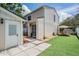 Charming two-story home featuring a cozy backyard and a welcoming front entrance at 103 E Davis Blvd # B, Tampa, FL 33606
