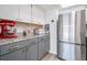 Kitchen featuring stainless steel appliances, granite countertops, and red stand mixer at 103 E Davis Blvd # B, Tampa, FL 33606