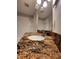 Bathroom featuring granite countertops and shower over tub at 10539 Egret Haven Ln, Riverview, FL 33578