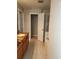 Bathroom featuring tan tile, granite counters, and a separate shower and tub at 10539 Egret Haven Ln, Riverview, FL 33578