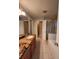Bathroom features double sinks with granite countertops and a walk-in shower at 10539 Egret Haven Ln, Riverview, FL 33578