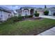 Charming single-story home featuring a well-manicured lawn and a two-car garage at 10539 Egret Haven Ln, Riverview, FL 33578
